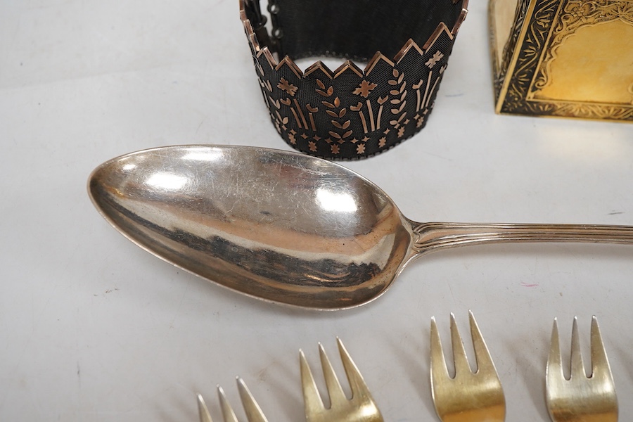 A modern silver gilt Amouage perfume bottle in the form of Oman Palace Ruwi mosque, maker possibly Asprey & Co, London, 1995, height 12.3cm, together with a George III silver Old English thread pattern basting spoon, by